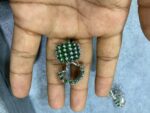 Green clip on studs